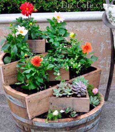 Flowerbed from a wooden barrel