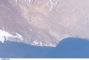 Center, theCape of Fartak, or in the ancient world Cape Syagrus. Photo by NASA.