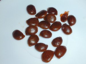 Roasted Persimmon seeds can be used to extend coffee. Photo by Really Raw Food.