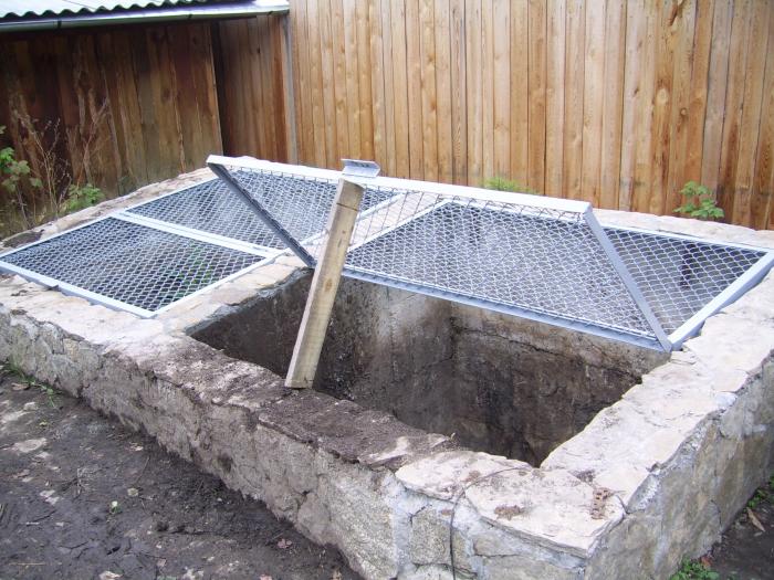 photo of a concrete pit for compost