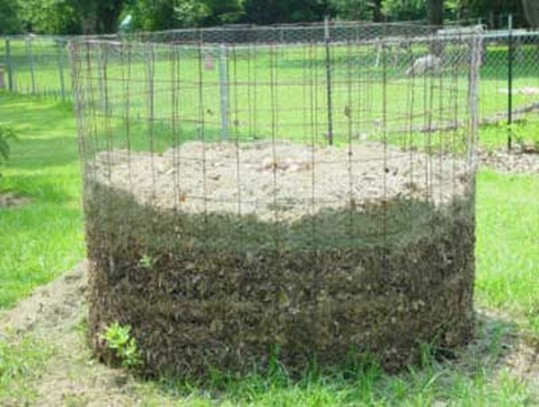photo of a metal compost heap