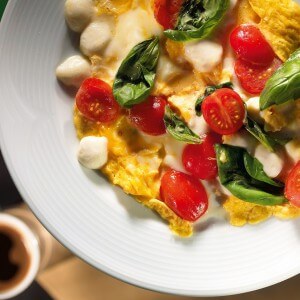 Omelet with mozzarella and tomatoes
