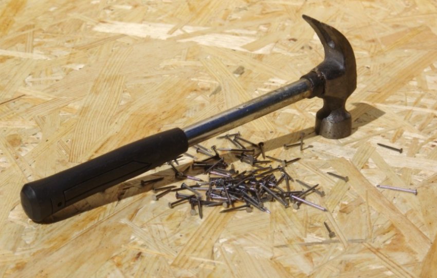 Hammer and nails for making sheep feeders